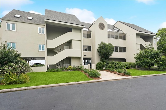 105 Mariners Is Unit 105, Mandeville, LA 70448 - view of apartment building / complex