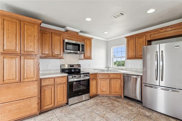 24092 Chef Menteur Hwy, New Orleans, LA 70129 - kitchen with appliances with stainless steel finishes, crown molding, light countertops, brown cabinetry, and recessed lighting