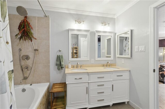 233 Penfold Pl, Harahan, LA 70123 - ensuite bathroom featuring double vanity, tiled shower / bath combo, and crown molding