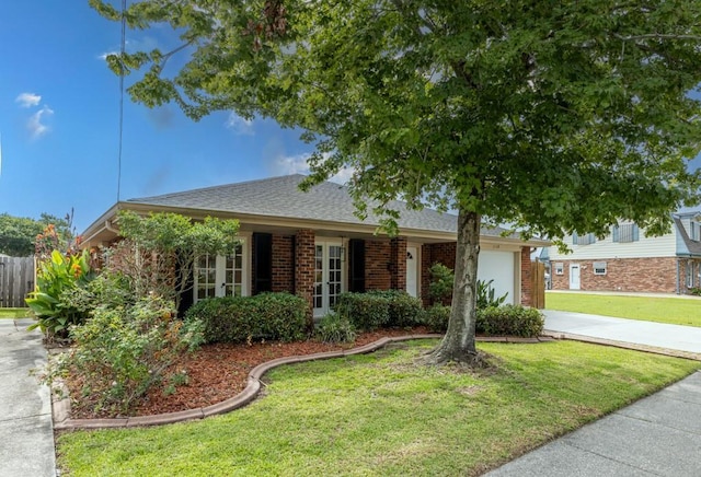 1729 High Ave, Metairie, LA 70001 - ranch-style house featuring driveway, a garage, brick siding, and roof with shingles