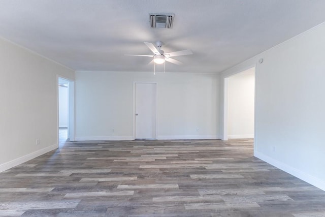 1729 High Ave, Metairie, LA 70001 - spare room with wood finished floors, a ceiling fan, and crown molding
