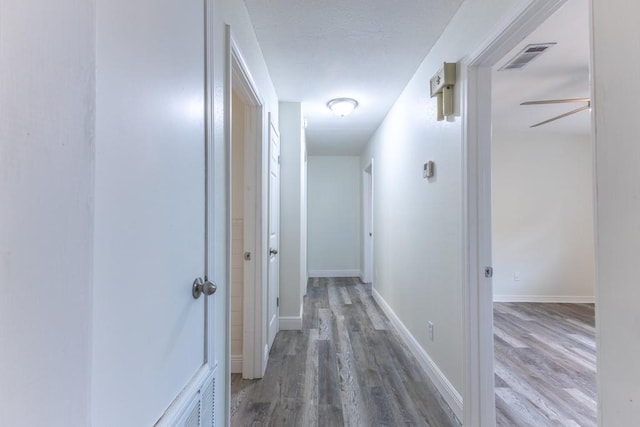 1729 High Ave, Metairie, LA 70001 - hallway with wood finished floors and baseboards