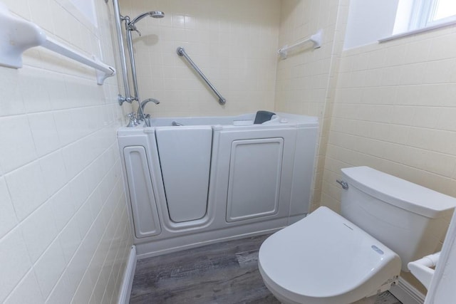 1729 High Ave, Metairie, LA 70001 - bathroom featuring tile walls and wood finished floors