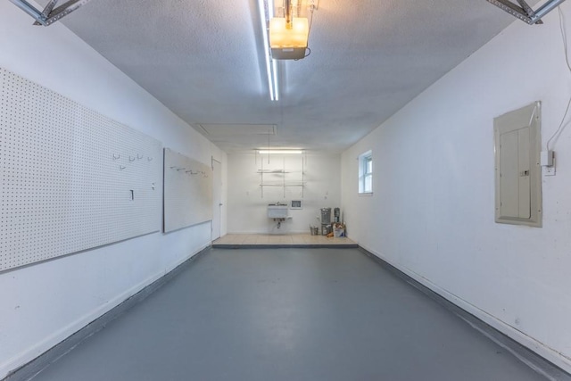 1729 High Ave, Metairie, LA 70001 - garage with electric panel and a garage door opener