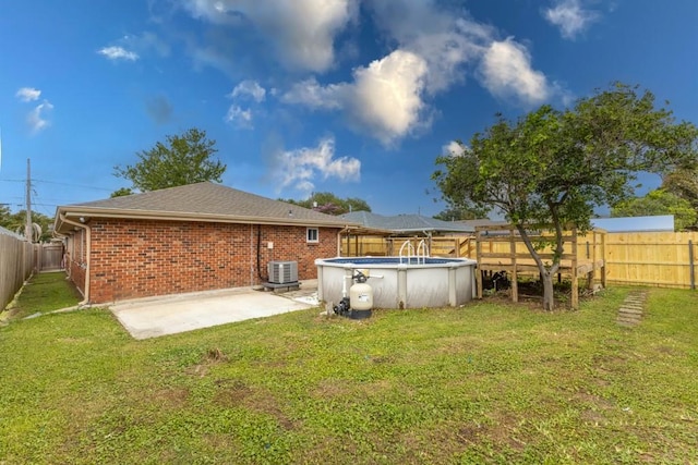 1729 High Ave, Metairie, LA 70001 - rear view of property featuring brick siding and a fenced backyard