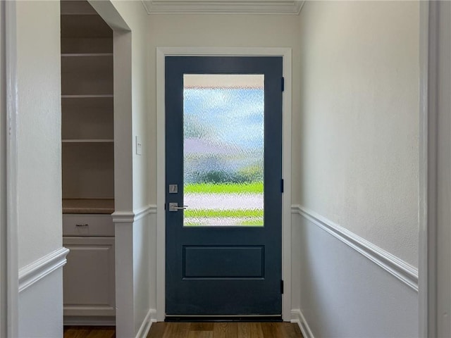 1904 Hall Ave, Metairie, LA 70003 - entryway with dark wood finished floors, ornamental molding, and healthy amount of natural light