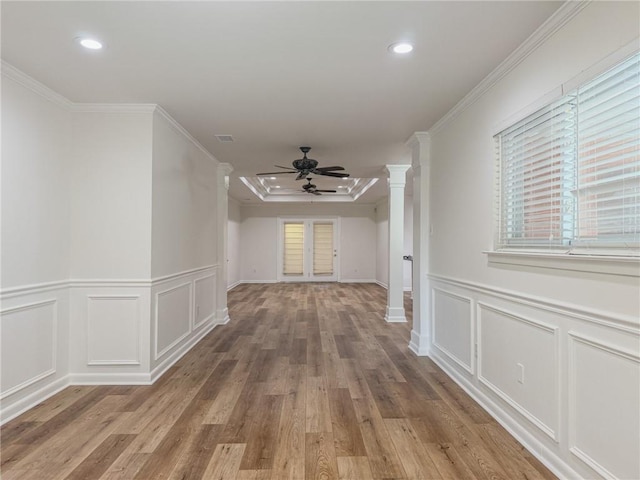 1904 Hall Ave, Metairie, LA 70003 - corridor featuring decorative columns, healthy amount of natural light, wood finished floors, recessed lighting, and a decorative wall