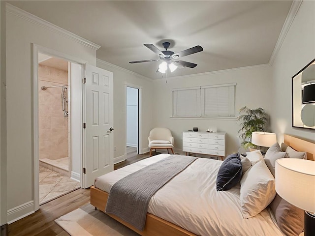 1904 Hall Ave, Metairie, LA 70003 - bedroom with wood finished floors, ornamental molding, ceiling fan, and ensuite bath