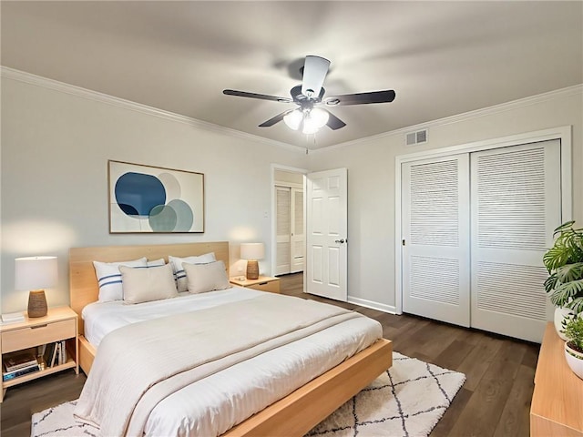 1904 Hall Ave, Metairie, LA 70003 - bedroom featuring a closet, ornamental molding, dark wood finished floors, and ceiling fan