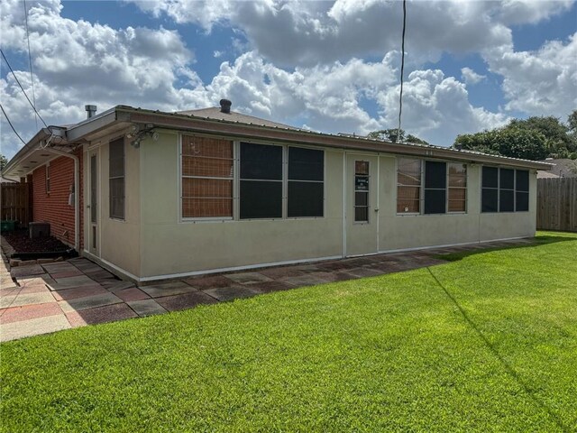 1904 Hall Ave, Metairie, LA 70003 - rear view of house featuring stucco siding