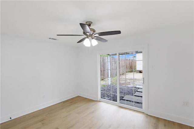 1909 Maryland Ave, Kenner, LA 70062 - unfurnished room with light wood-style floors and ceiling fan