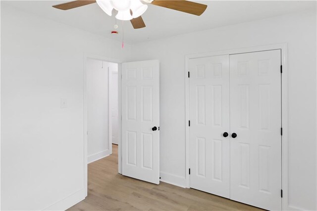 1909 Maryland Ave, Kenner, LA 70062 - unfurnished bedroom with light wood-style flooring, a closet, and ceiling fan
