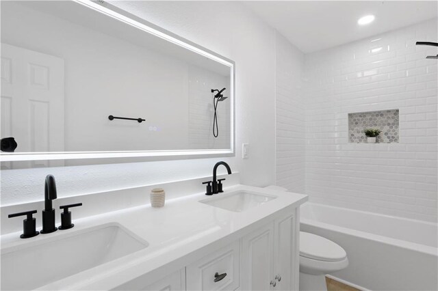 1909 Maryland Ave, Kenner, LA 70062 - full bath featuring double vanity, tub / shower combination, and recessed lighting
