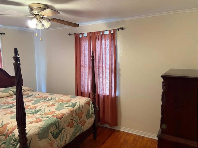 121 Sigma St, Belle Chasse, LA 70037 - bedroom featuring crown molding, wood finished floors, and ceiling fan