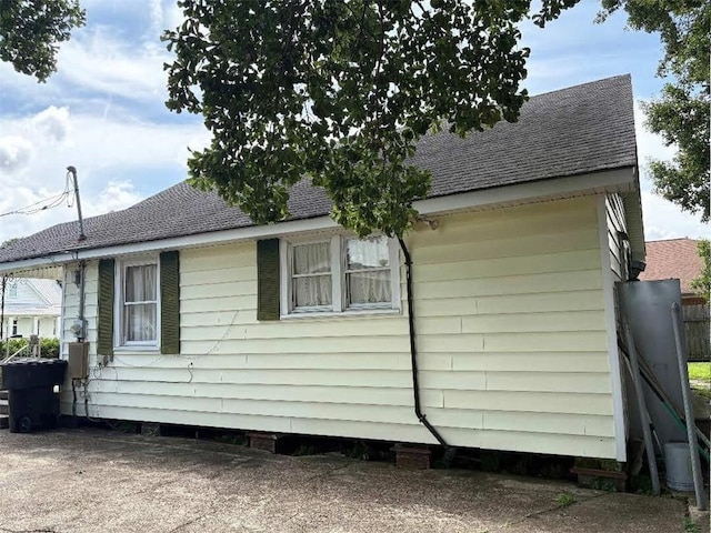121 Sigma St, Belle Chasse, LA 70037 - view of side of property featuring roof with shingles