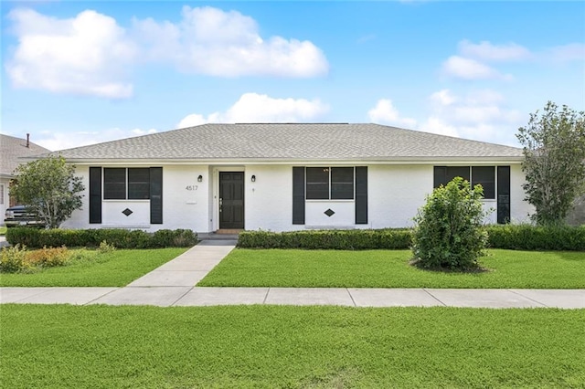 4517 Purdue Dr, Metairie, LA 70003 - ranch-style house featuring a front lawn
