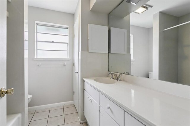 4517 Purdue Dr, Metairie, LA 70003 - full bathroom with vanity, a shower, tile patterned flooring, and a tub to relax in
