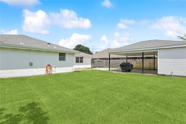 4517 Purdue Dr, Metairie, LA 70003 - fenced backyard with a patio area