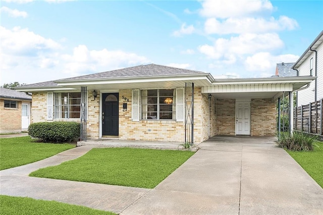 508 Beverly Garden Dr, Metairie, LA 70005 - view of front of house with driveway, an attached carport, brick siding, and covered porch