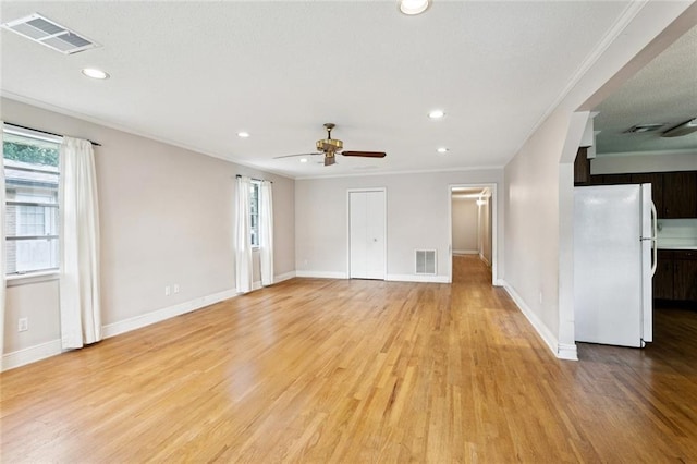508 Beverly Garden Dr, Metairie, LA 70005 - unfurnished living room featuring a ceiling fan, crown molding, recessed lighting, and light wood-style floors
