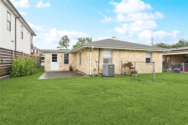 508 Beverly Garden Dr, Metairie, LA 70005 - back of property featuring a patio area, brick siding, and a fenced backyard
