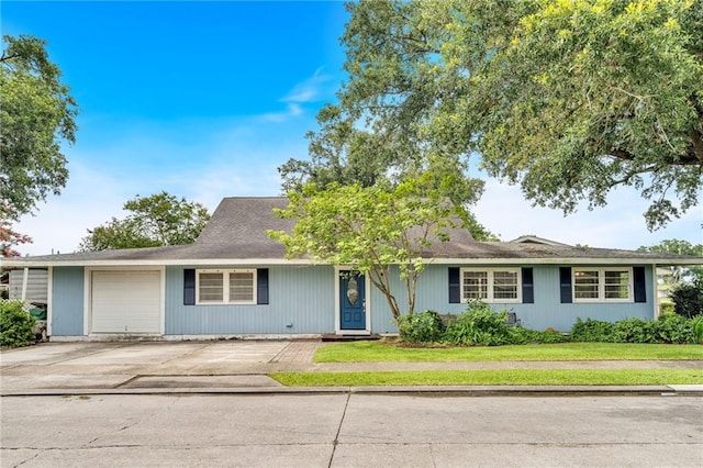 174 Celia Dr, Luling, LA 70070 - view of front of property featuring concrete driveway and an attached garage