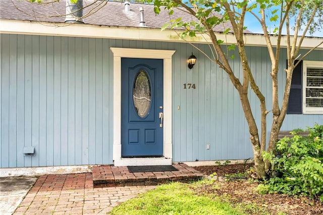 174 Celia Dr, Luling, LA 70070 - doorway to property with a shingled roof