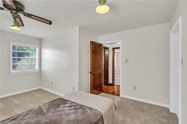 174 Celia Dr, Luling, LA 70070 - bedroom with light colored carpet and ceiling fan