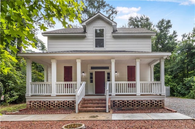 71434 Saint Joseph St, Abita Springs, LA 70420 - farmhouse featuring covered porch and a shingled roof