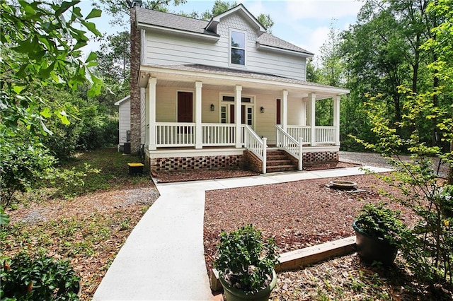 71434 Saint Joseph St, Abita Springs, LA 70420 - view of front of property with covered porch and roof with shingles
