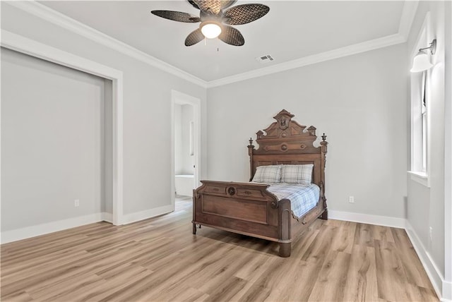 71434 Saint Joseph St, Abita Springs, LA 70420 - bedroom with light wood finished floors, ornamental molding, and ceiling fan