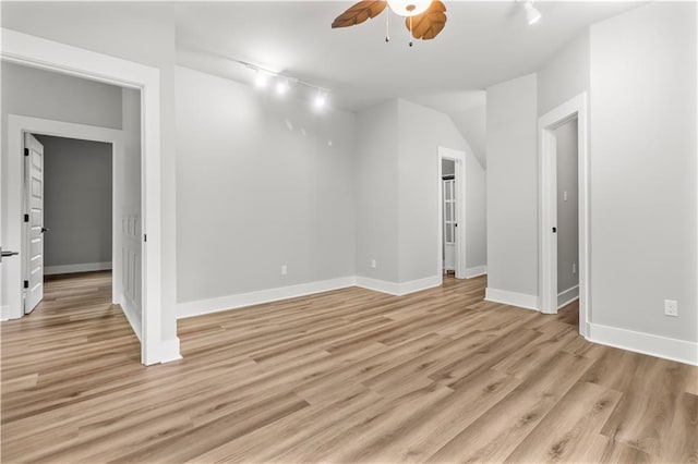 71434 Saint Joseph St, Abita Springs, LA 70420 - unfurnished room featuring rail lighting, light wood finished floors, and a ceiling fan