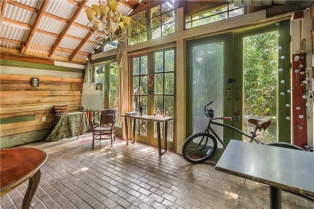 71434 Saint Joseph St, Abita Springs, LA 70420 - sunroom with french doors, vaulted ceiling, and a chandelier