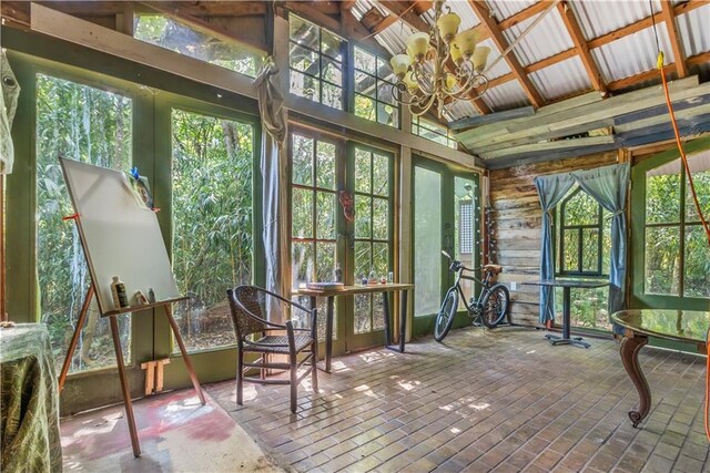71434 Saint Joseph St, Abita Springs, LA 70420 - sunroom / solarium with a chandelier, french doors, and vaulted ceiling