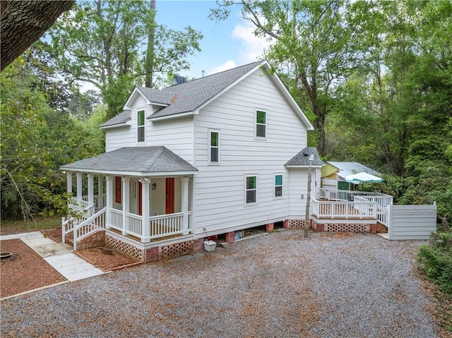 71434 Saint Joseph St, Abita Springs, LA 70420 - view of front of property with roof with shingles and a porch