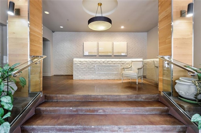 333 Girod St Unit 304, New Orleans, LA 70130 - stairway with brick wall