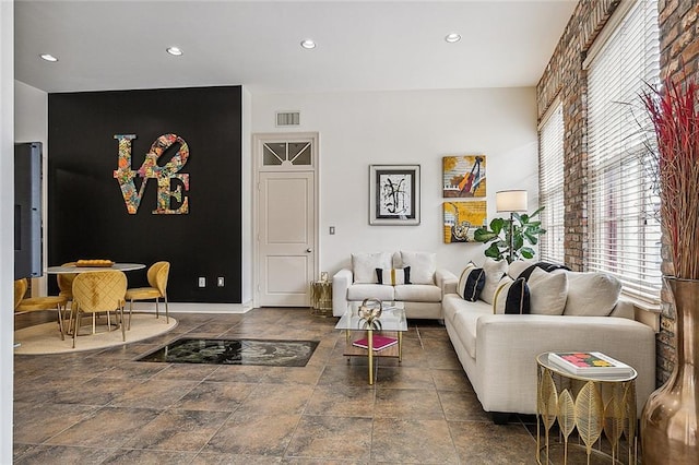 333 Girod St Unit 304, New Orleans, LA 70130 - living area featuring stone finish flooring and recessed lighting