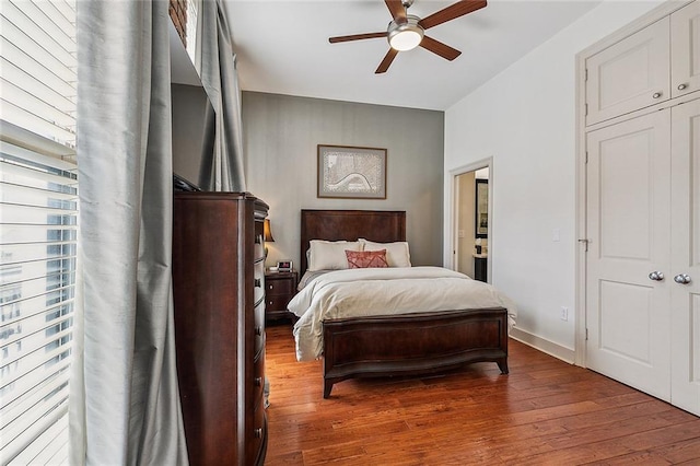 333 Girod St Unit 304, New Orleans, LA 70130 - bedroom featuring wood finished floors and a ceiling fan