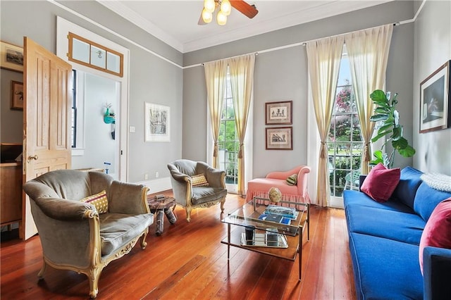 422 Alix St, New Orleans, LA 70114 - living area featuring hardwood / wood-style flooring, crown molding, and ceiling fan