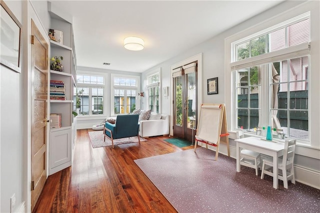 422 Alix St, New Orleans, LA 70114 - sitting room with dark wood-type flooring