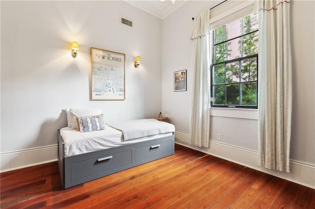 422 Alix St, New Orleans, LA 70114 - bedroom with wood-type flooring and ornamental molding