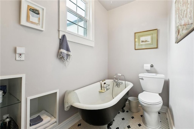 422 Alix St, New Orleans, LA 70114 - bathroom featuring a soaking tub and tile patterned floors