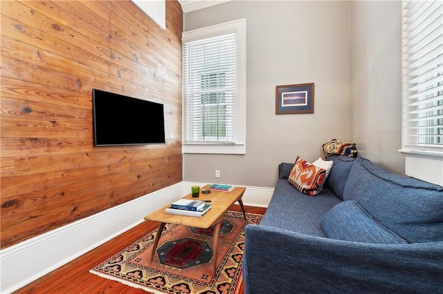 422 Alix St, New Orleans, LA 70114 - living room with healthy amount of natural light, wood finished floors, and wooden walls