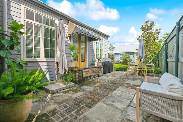 422 Alix St, New Orleans, LA 70114 - view of patio with area for grilling and outdoor dining area