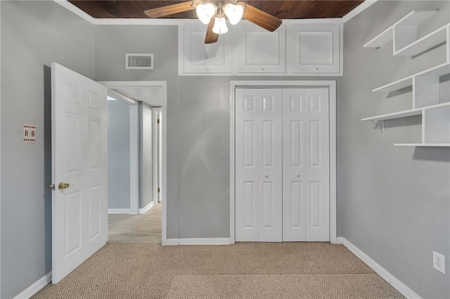 7 Albert Ct, Metairie, LA 70003 - unfurnished bedroom featuring light colored carpet, a closet, ceiling fan, and wood ceiling