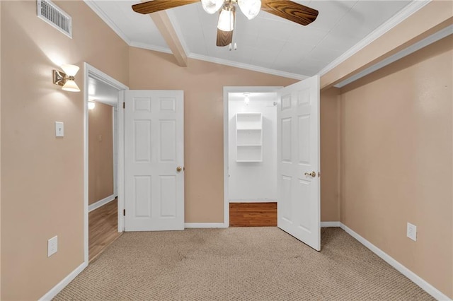 7 Albert Ct, Metairie, LA 70003 - unfurnished bedroom featuring ornamental molding, lofted ceiling, light carpet, and a ceiling fan