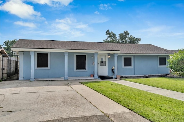 7 Albert Ct, Metairie, LA 70003 - ranch-style home with a porch, roof with shingles, and stucco siding