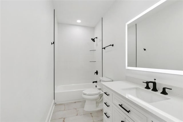 4544 Prairie St, Metairie, LA 70001 - bathroom with vanity, washtub / shower combination, marble look tiles, and recessed lighting