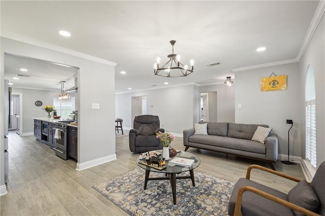 4404 Belle Dr, Metairie, LA 70006 - living room featuring a chandelier, recessed lighting, light wood-type flooring, and crown molding