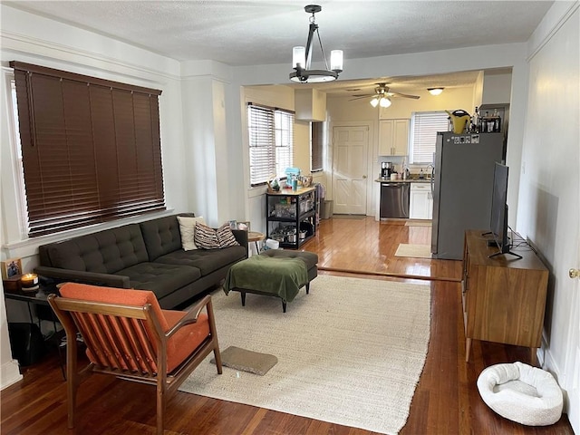 7935 Fig St, New Orleans, LA 70125 - living room with wood finished floors and ceiling fan